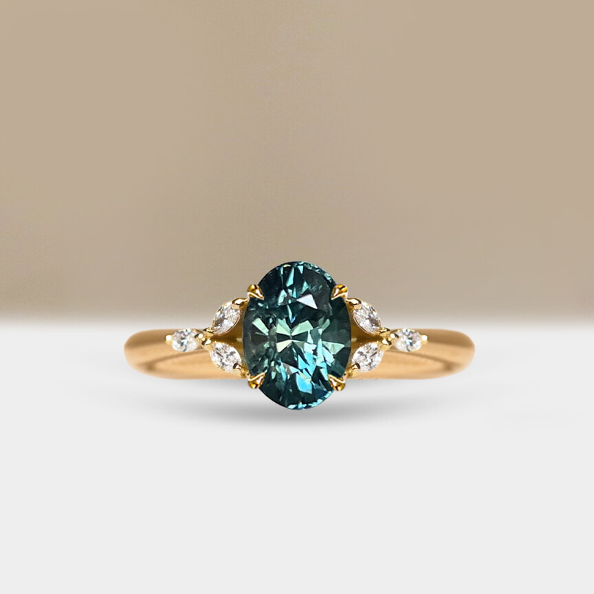 Oval teal sapphire engagement ring with diamond side stones